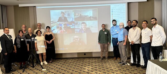 Group picture in the conference room